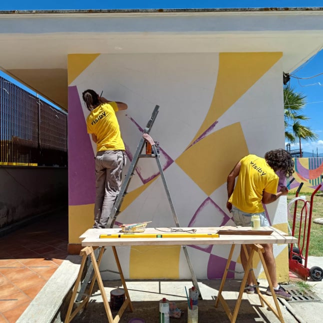 visiby decoración de espacio comercial con realización de mural en Francy Arena de Orte